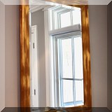 D26. Wooden brushed goldtone beveled mirror. 44”h x 31”w - $225 